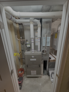 Curtis and Sons Plumbing in Parker Colorado plumbing demonstration work furnace install